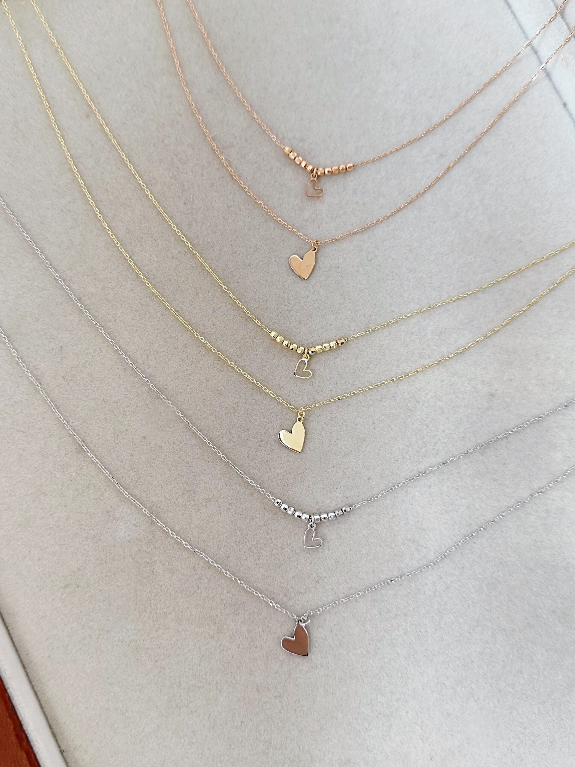 Collana duetto con cuore e perlina o cuore