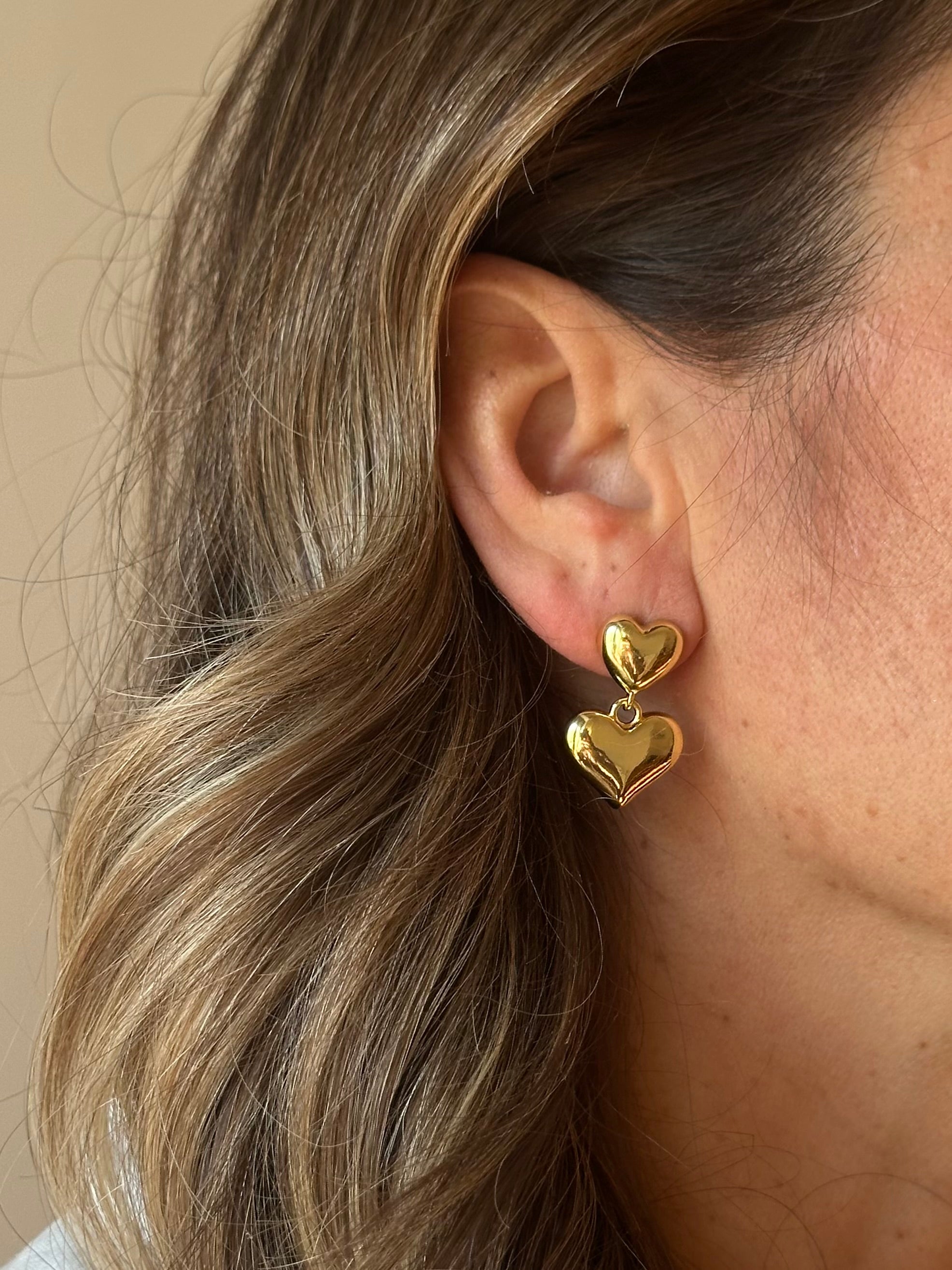 Orecchini cuore doppio pendente brass