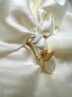 Anello incrocio piatto