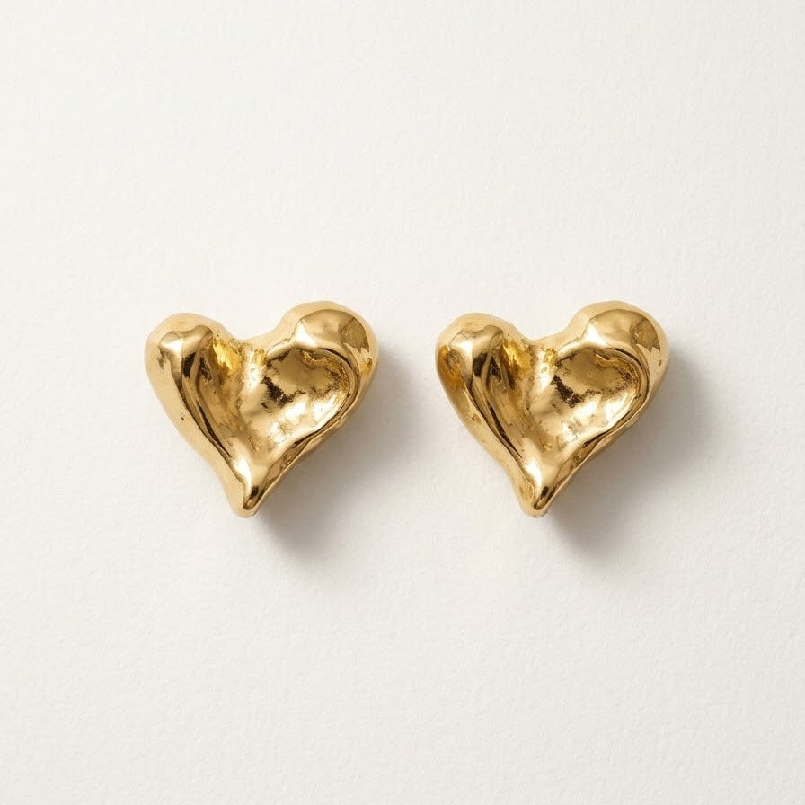 Orecchini cuore martellato brass