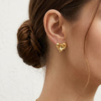 Orecchini cuore martellato brass