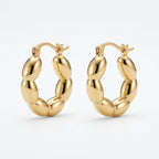 Orecchini bottoni martellati brass
