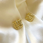 Orecchini toppe intreccio brass