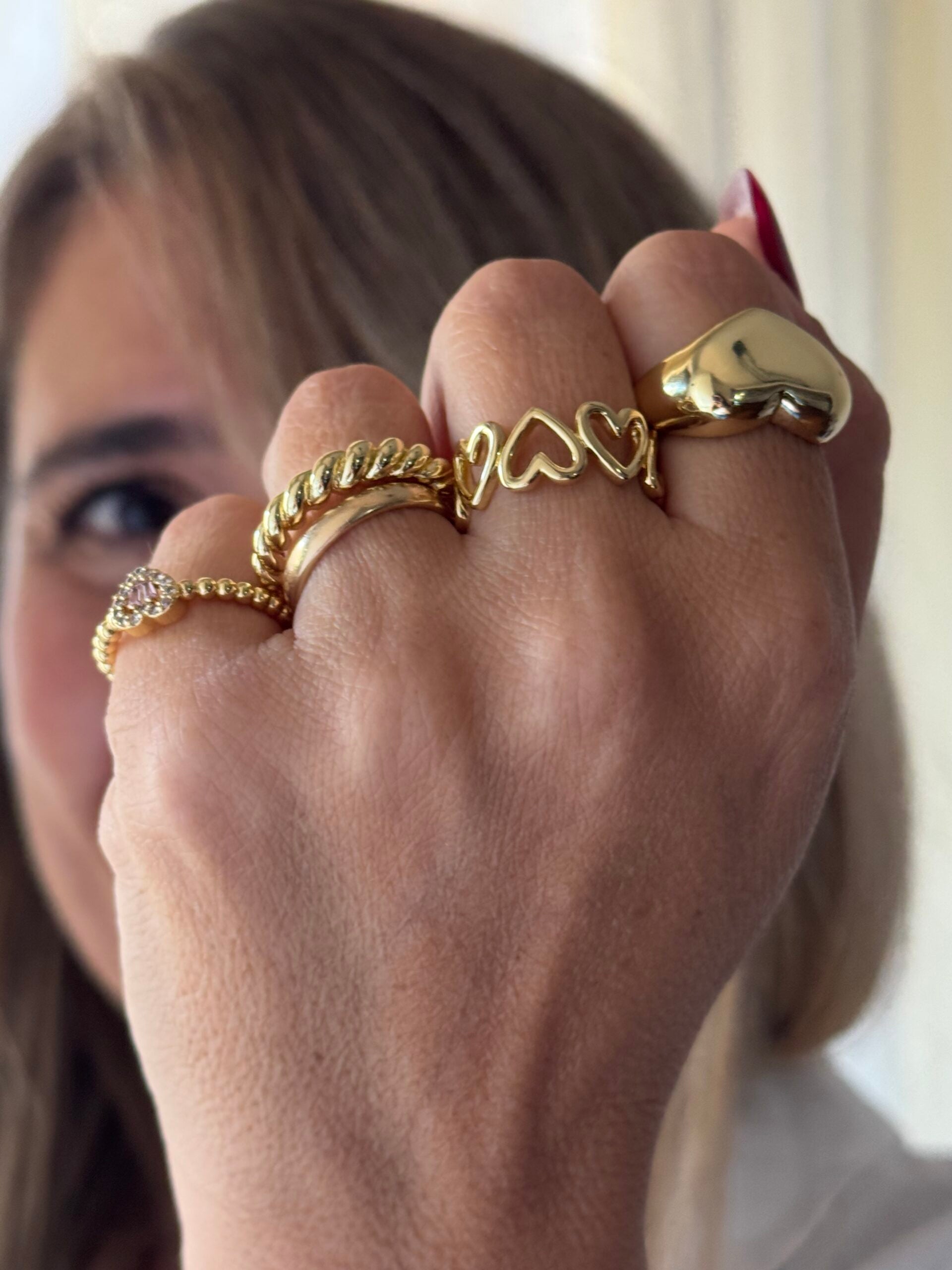 Anello fascetta cuori profilo brass