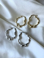 Cerchi sinuosi slim brass