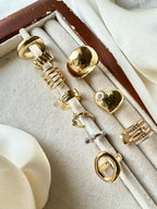 Earcuff fascetta e dettaglio tondo in rilievo brass