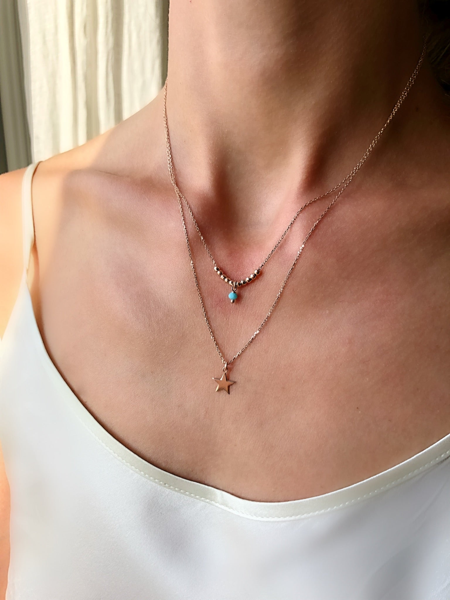 Collana duetto con stella e perlina